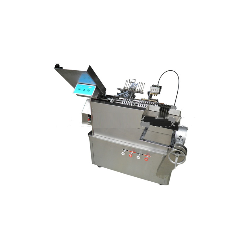 Ampoule filling and sealing machine